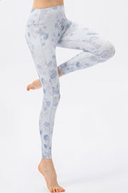 Light blue floral print skinny fit leggings with a high waist.