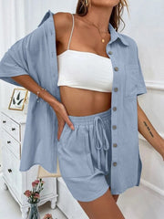 Light blue linen shirt and shorts set with drawstring waist and button front.
