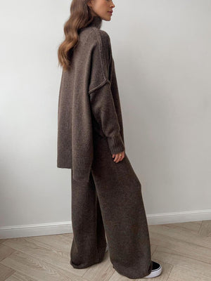 Oversized turtleneck lounge set in coffee brown acrylic with wide-leg pants.