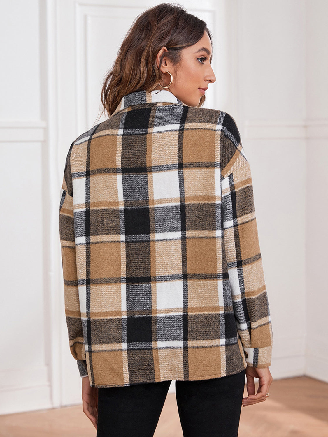 Oversized plaid shacket in camel, black, white, and brown with button closure.