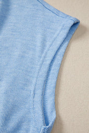 Light blue cap sleeve knit top with textured fabric detail