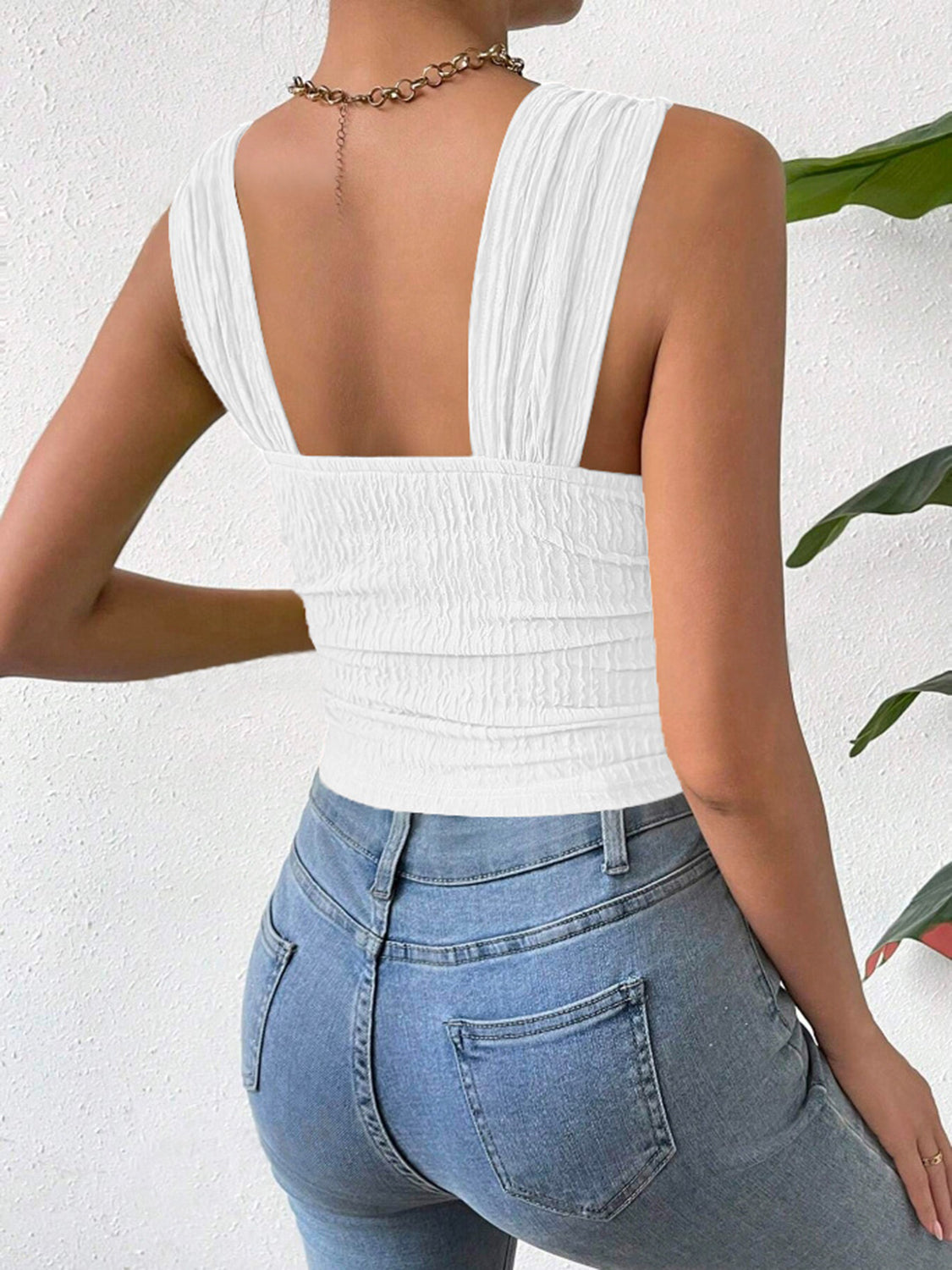White textured crinkle strap crop top with ruched bodice and square neckline.
