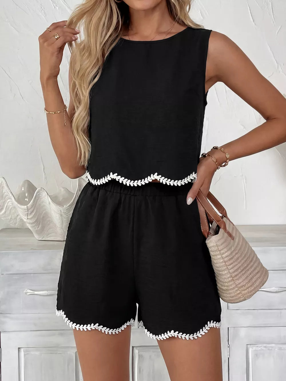Black sleeveless tank top and shorts set with white trim detail