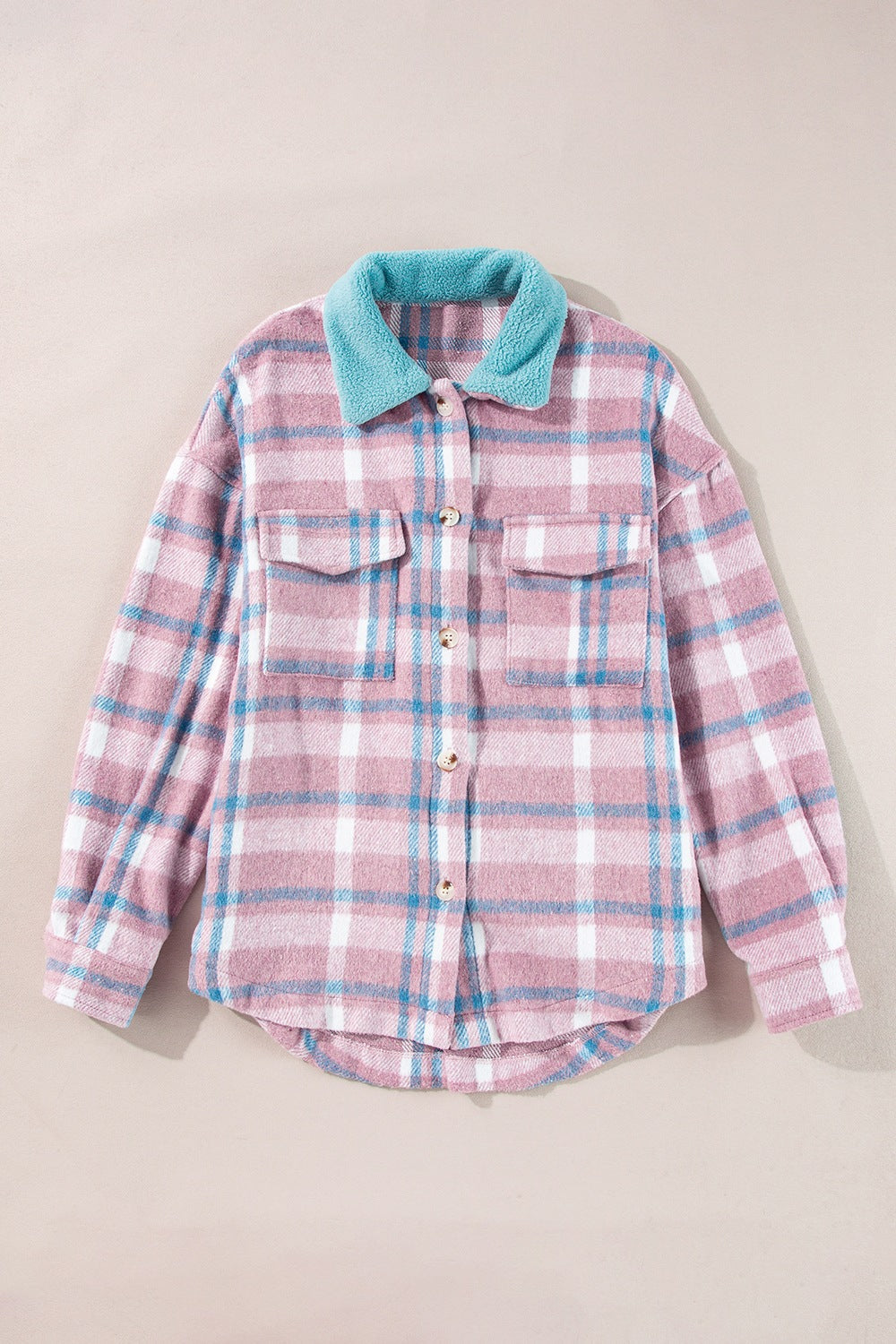 Pastel plaid shacket in dusty pink with a contrast fuzzy blue collar and button front.