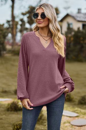 Pink purple waffle knit raglan sweater with laser cut sleeves and v-neck