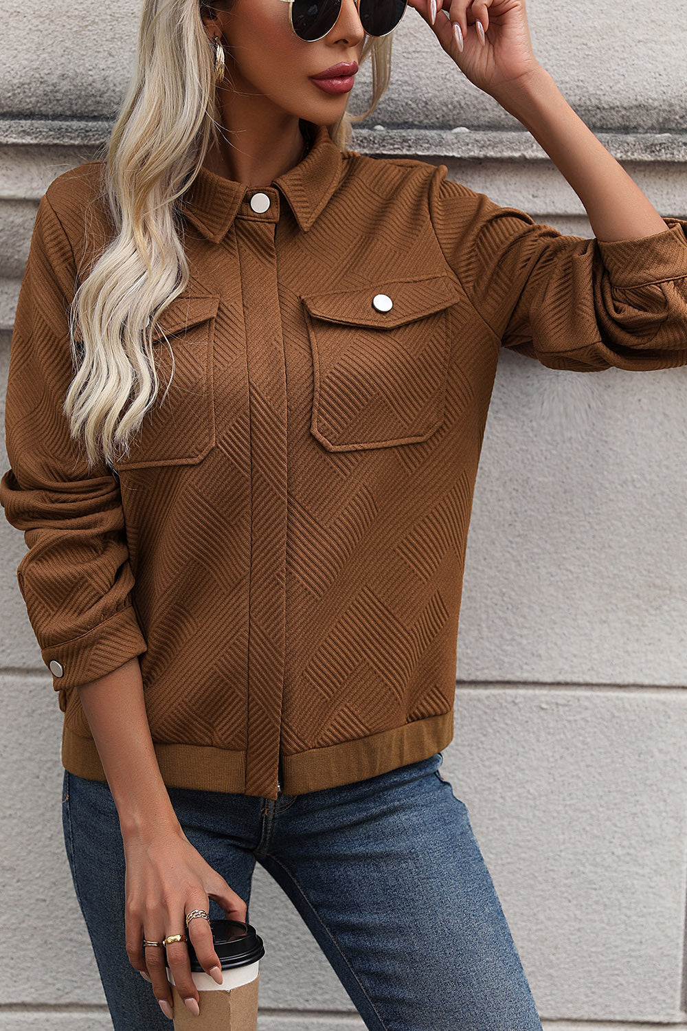 Textured chevron utility jacket in burnt umber with chest pockets and zip front.