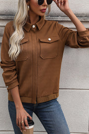 Textured chevron utility jacket in burnt umber with chest pockets and zip front.