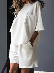 White raw-edge pocket tee and Bermuda shorts set for women, casual and comfortable.