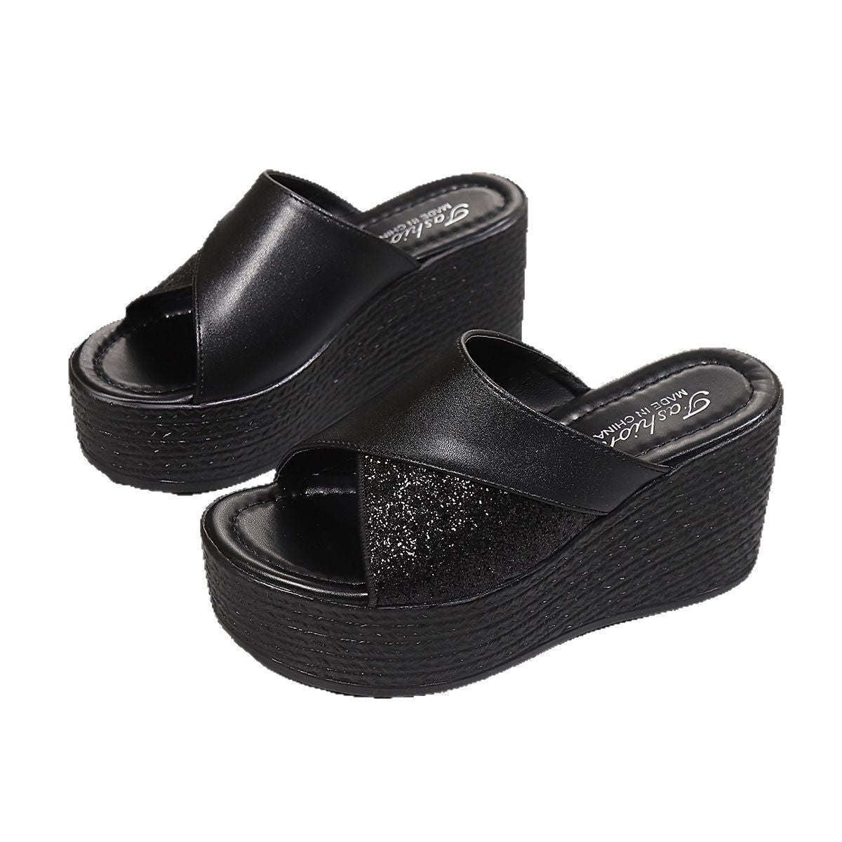 Black open-toe wedge sandals with glitter-embellished cross-over straps.