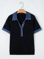 Black textured knit polo top with denim collar and sleeve trim, button-down front.