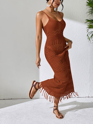 Camel crochet maxi dress with V-neck, spaghetti straps, and a fringe hem.