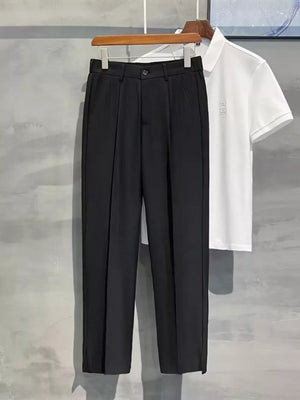 Black men's sweatpants with elevated seam detail and a straight leg cut.