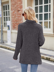 Charcoal ribbed turtleneck sweater with side slits and long sleeves.