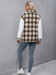 Plaid shacket with shearling sleeves and collared neck.