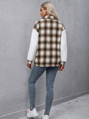 Plaid shacket with shearling sleeves and collared neck.