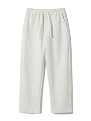 Men's gray heather sweatpants with drawstring and pockets, loose fit.