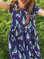 Navy blue cotton toddler dress with playful pigeon print, short sleeves, and gathered skirt.