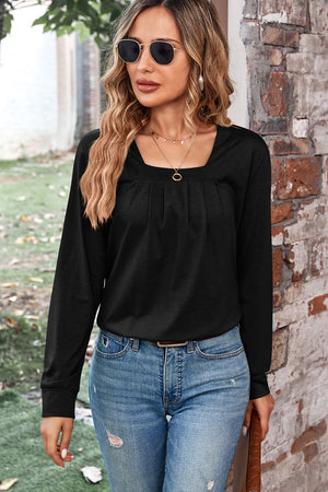 Black long sleeve blouse with square neckline and subtle pleats.