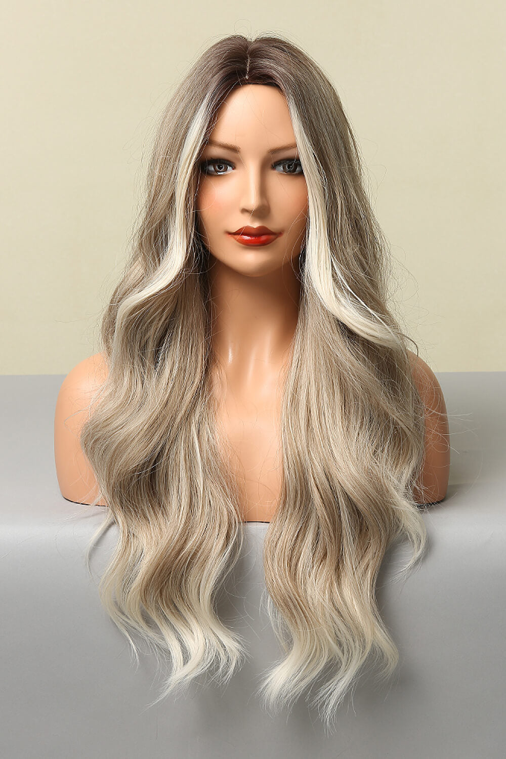 Ombre beach wave wig in light brown/blonde balayage with face-framing highlights.