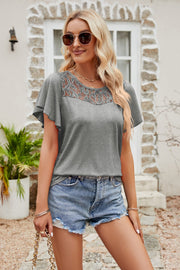 Mid Gray lace yoke flutter sleeve tee with round neckline.
