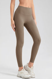 Women's Khaki high-waisted sculpted contour leggings with a seamless design.