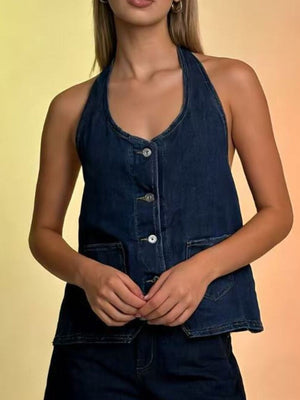 Dark blue denim halter vest with button-down front and pocket details.