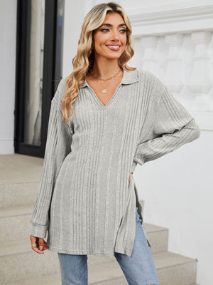 Light gray ribbed knit collared tunic top with V-neck and side slits.