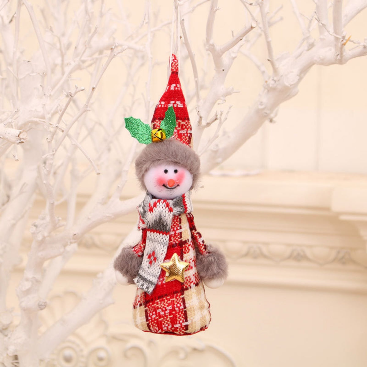 Festive plaid gnome ornament with red, white, and caramel colors, a star accent, and fuzzy trim.