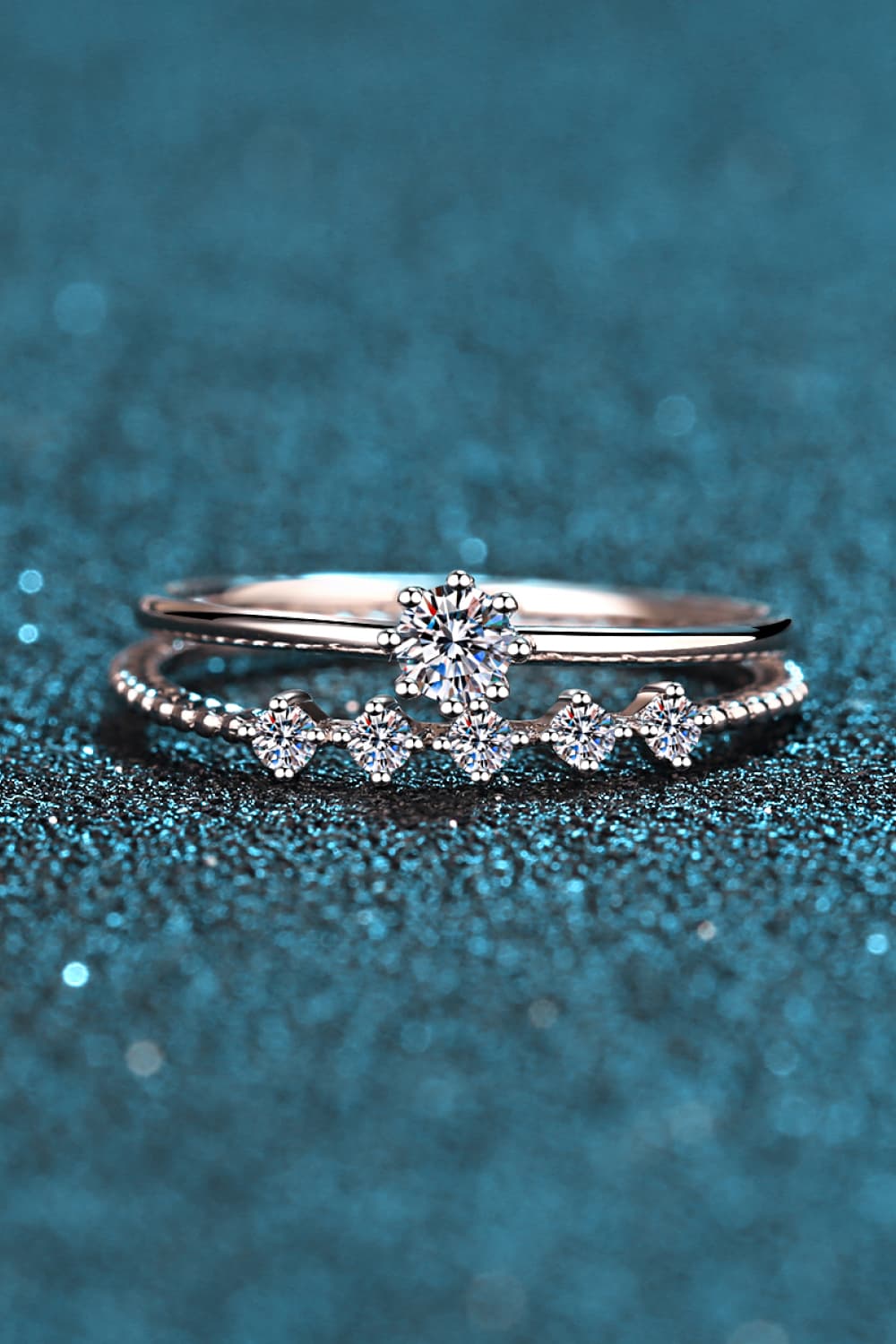 Silver layered ring set with moissanite stones and beaded band detail