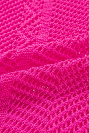 Open-knit chevron sleeve top in hot pink acrylic with a textured stitch pattern.