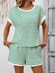 Green and white striped loungewear set with shorts and a short-sleeve top, featuring pockets.