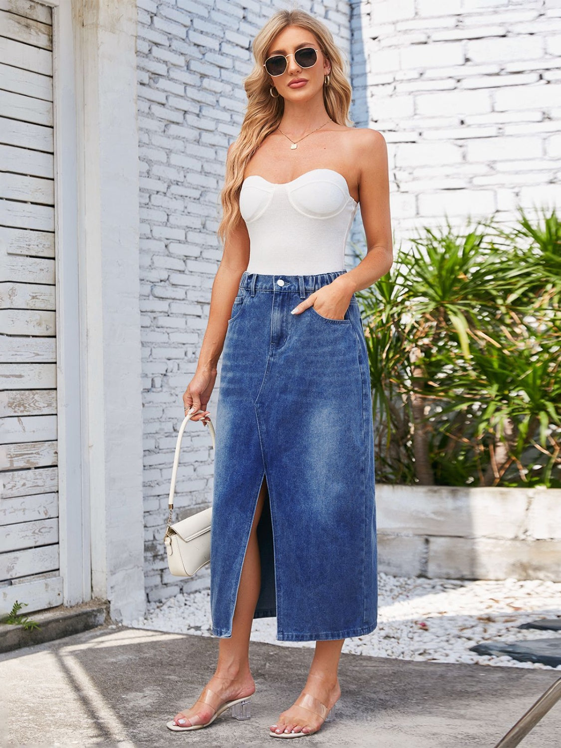 Light blue denim midi skirt with elastic waist and front slit