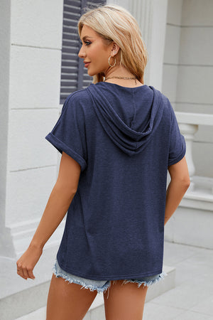 Dark blue hooded t-shirt with rolled short sleeves and a relaxed fit.