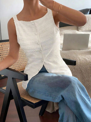 White wavy textured button-front tank top with square neckline and sleeveless cut.