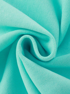 Mint blue kids' sweatshirt fabric detail, soft knit texture.