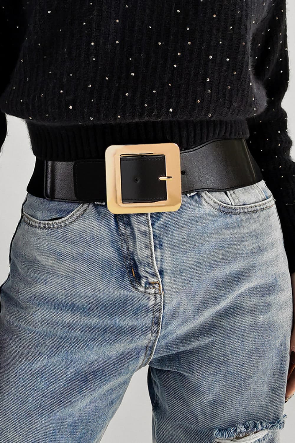 Black vegan leather belt with a wide square gold buckle.