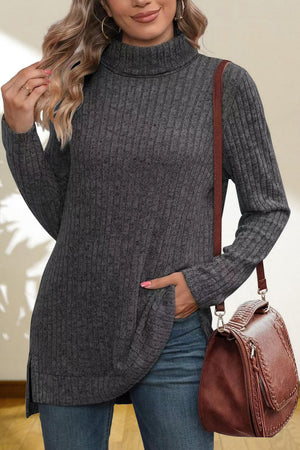 Charcoal ribbed knit turtleneck tunic top with side slits and a relaxed fit.