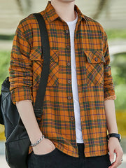 Men's yellow blue grid plaid cotton button-up shirt with two chest pockets.