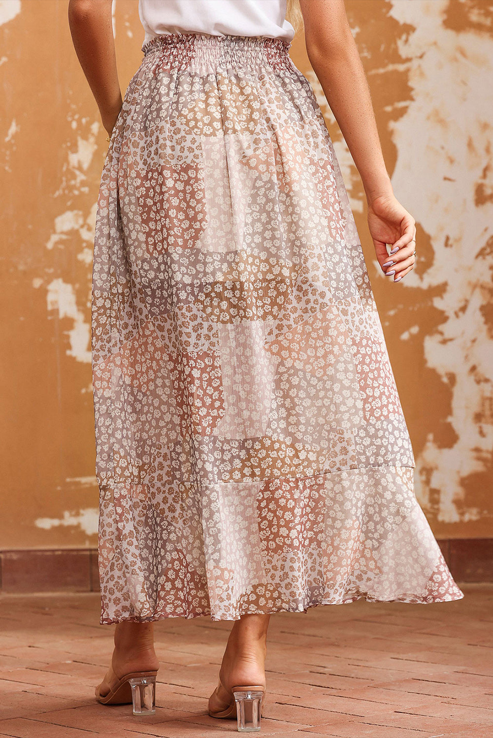 Patchwork floral maxi skirt with smocked waist and tiered hem