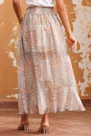 Patchwork floral maxi skirt with smocked waist and tiered hem