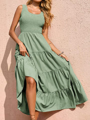 Light Green smocked bodice ruffled maxi dress with tiered skirt and square neckline.