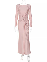 Pink ruched long sleeve maxi dress with boat neckline and knot detail