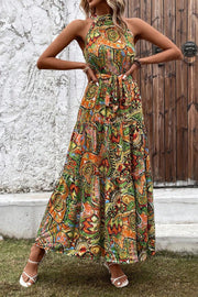 Halter neck maxi dress with paisley print and tiered skirt