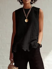 Black sleeveless tank top with scalloped hem detail.