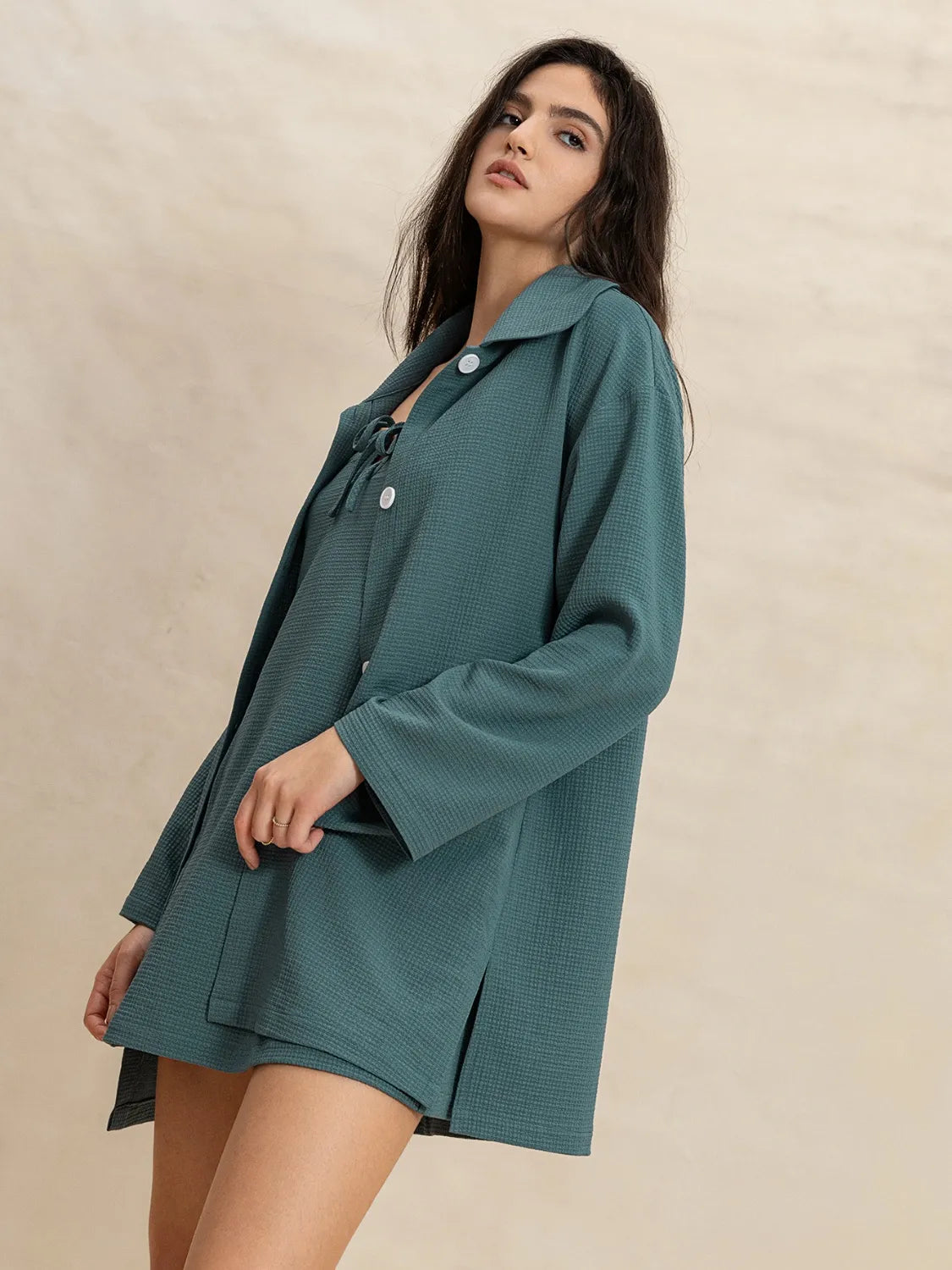 Textured French Blue mini dress and duster set with tie-front detail and button closure.