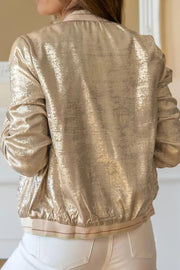 Metallic bomber jacket in tan with ribbed trim and a textured sheen.