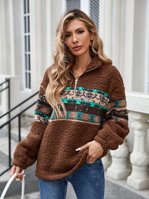 Brown sherpa quarter-zip pullover with Aztec trim and a relaxed fit.