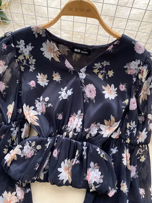 Black floral chiffon blouse with balloon sleeves and ruched waist