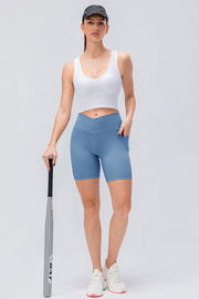 Light Blue cross-waist active bike shorts with pockets and a ribbed texture.