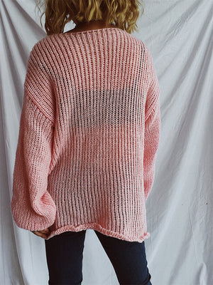 Blush pink open-knit slouchy boatneck pullover sweater with ribbed detail.